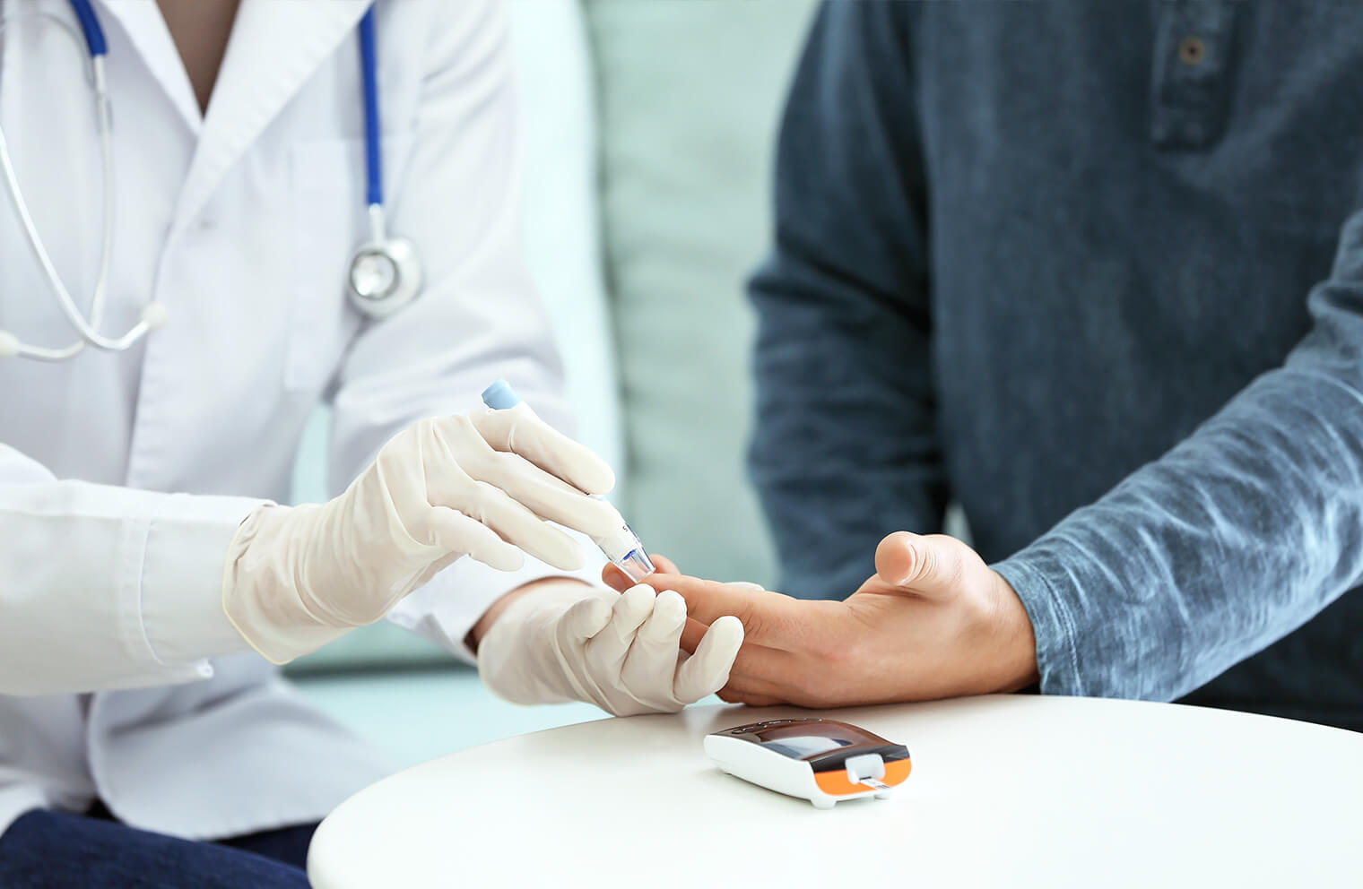A man with diabetes gets his blood sugar level checked.