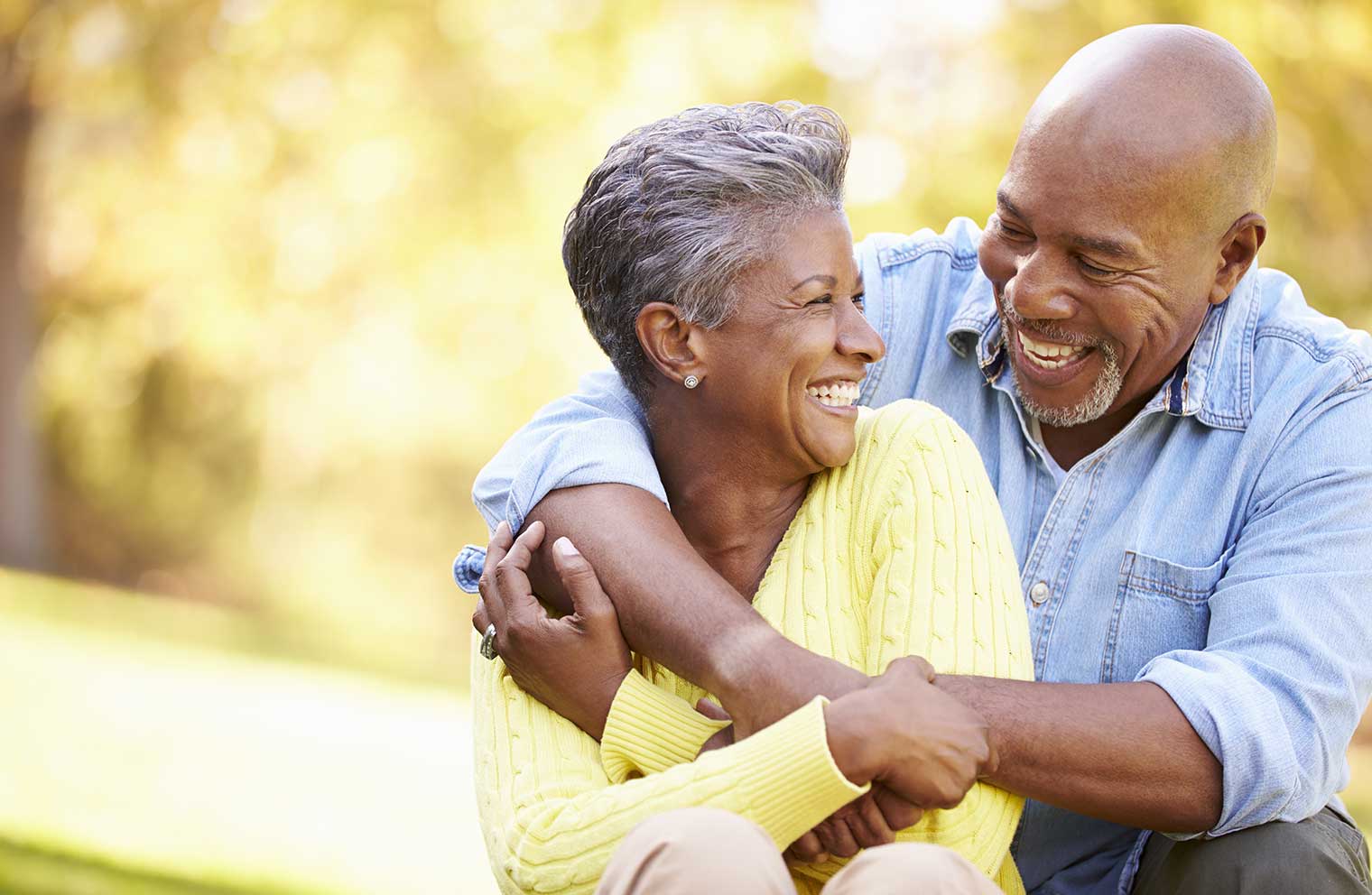 Couple hugging and smiling